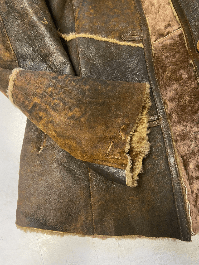 Vintage 90's Women Distressed Sheepskin Jacket in Brown - NorthernGrip