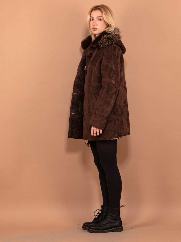 Vintage 90's Women Hooded Faux Sheepskin Coat in Brown - NorthernGrip